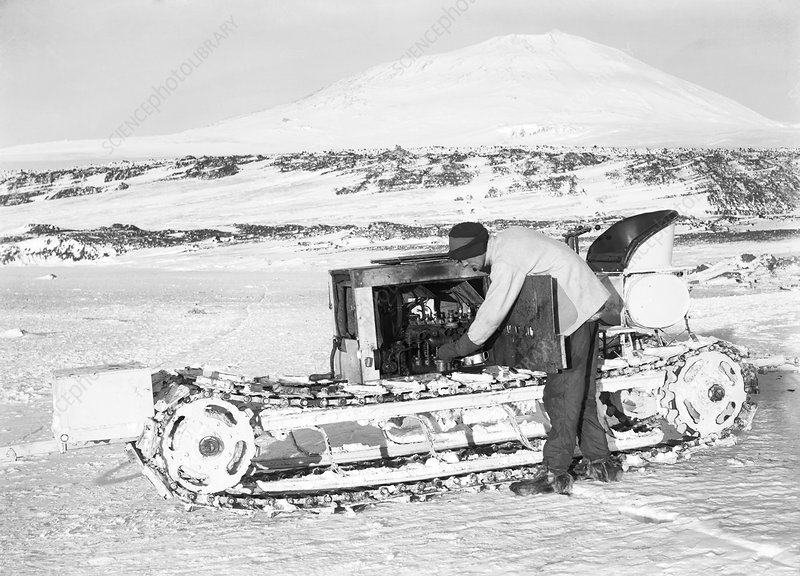 Bernard Day working on one of the motorised sledges used on the British Antarctic Expedition (1910-1913)